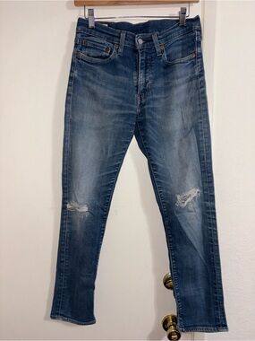 Levi's 511 Slim Fit Jeans featuring a faded Blue Distressed Leather Patch 31x32
